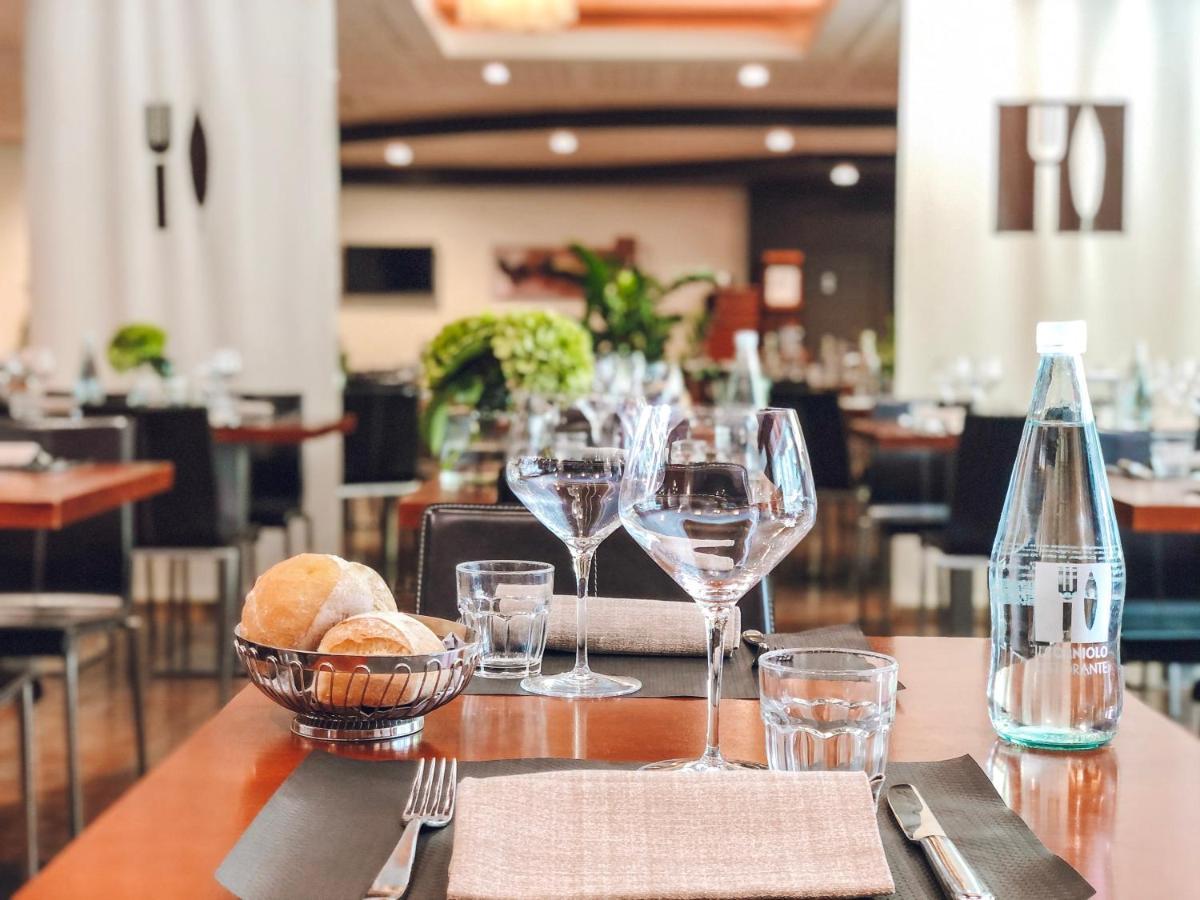 Best Western Plus Hotel Le Favaglie Cornaredo Esterno foto