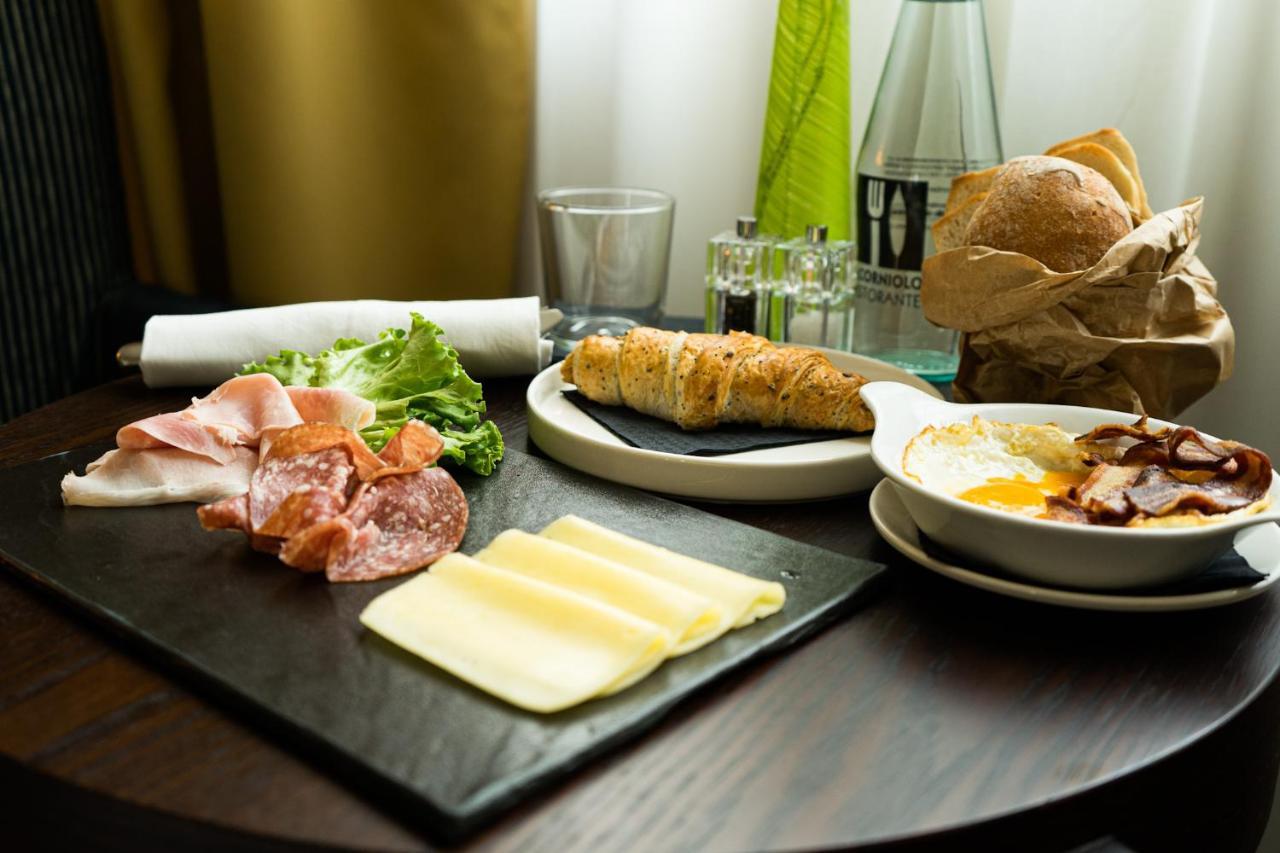 Best Western Plus Hotel Le Favaglie Cornaredo Esterno foto